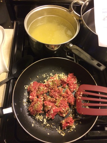 Boiling the orzo (I vastly overestimated the size of pan needed) and cooking the hamburger with spices