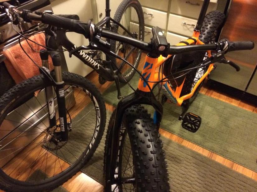 Skinny Fate, meet beefy Fat Boy!  Trying to work out a rough bike fit in my kitchen... never mind the fact the Fat Boy takes up half my kitchen!