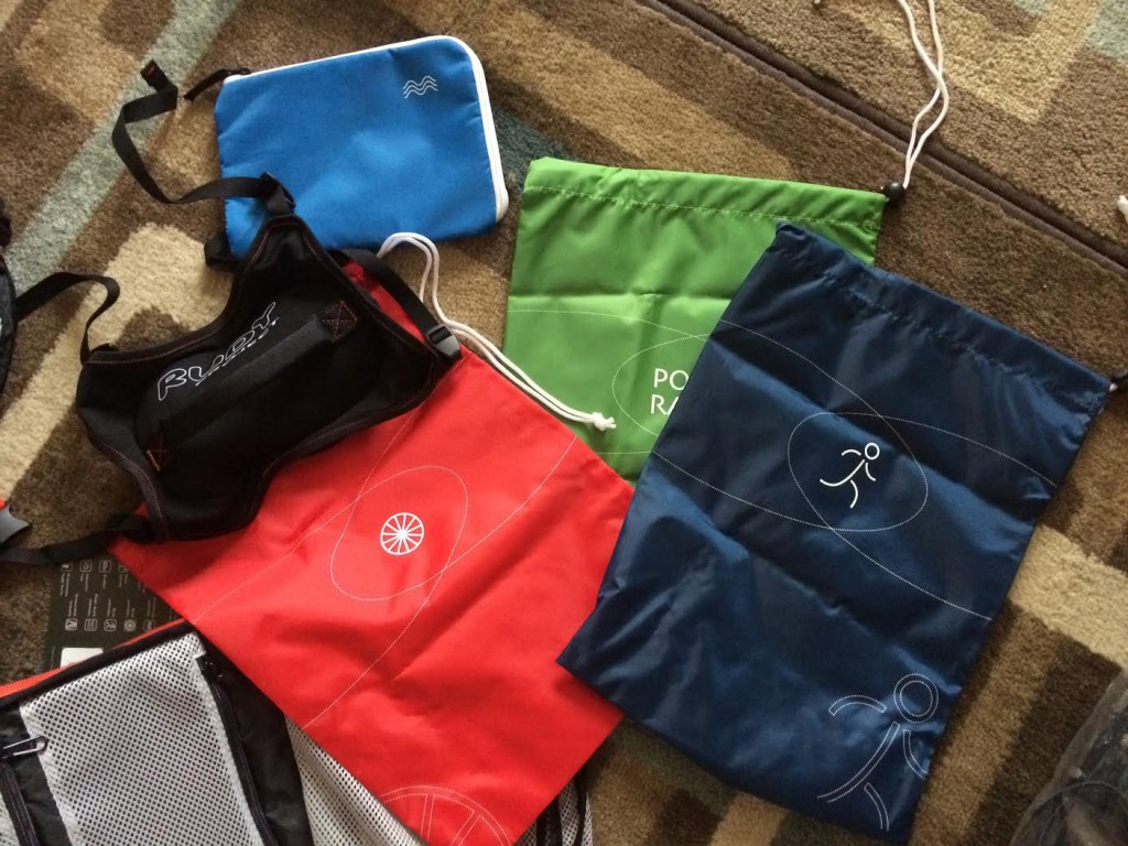 The bag comes with a padded helmet attacher to use on the outside (good for aero helmets, which I think was their intent), and several stuff sacks and a waterproof bag.  Definitely designed for triathlon!