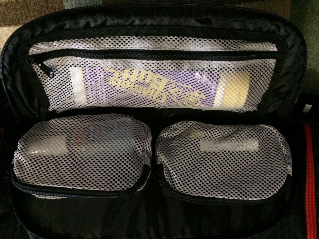 Front zippered pocket with 3 storage compartments